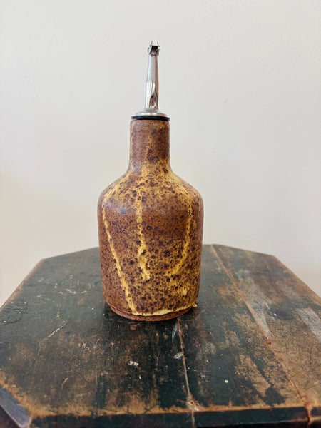 Yellow and Brown Oil Dispenser