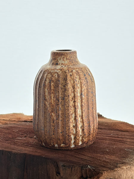 Tan fluted vessel
